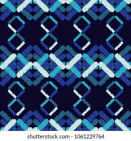 Ethnic boho seamless pattern. Embroidery on fabric. Scribble texture. Folk motif. Textile rapport.