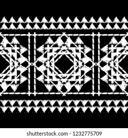 Ethnic boho seamless pattern. Embroidery on fabric. Traditional ornament. Tribal pattern. Folk motif. Can be used for wallpaper, textile, invitation card, wrapping, web page background.