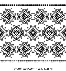 Ethnic boho seamless pattern. Embroidery on fabric. Patchwork texture. Weaving. Traditional ornament. Tribal pattern. Folk motif. Can be used for wallpaper, textile, invitation card, wrapping, web.