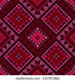 Ethnic boho seamless pattern. Embroidery on fabric. Patchwork texture. Weaving. Traditional ornament. Tribal pattern. Folk motif. Can be used for wallpaper, textile, invitation card, wrapping, web.