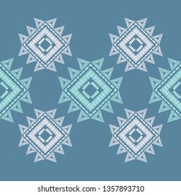 Ethnic boho seamless pattern. Embroidery on fabric. Patchwork texture. Weaving. Traditional ornament. Tribal pattern. Folk motif. Can be used for wallpaper, textile, invitation card, wrapping, web.