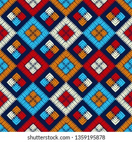 Ethnic boho seamless pattern. Embroidery on fabric. Patchwork texture. Weaving. Traditional ornament. Tribal pattern. Folk motif. Can be used for wallpaper, textile, invitation card, wrapping, web.