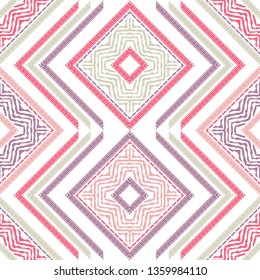 Ethnic boho seamless pattern. Embroidery on fabric. Patchwork texture. Weaving. Traditional ornament. Tribal pattern. Folk motif. Can be used for wallpaper, textile, invitation card, wrapping, web.