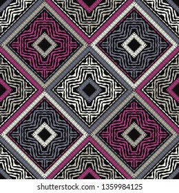 Ethnic boho seamless pattern. Embroidery on fabric. Patchwork texture. Weaving. Traditional ornament. Tribal pattern. Folk motif. Can be used for wallpaper, textile, invitation card, wrapping, web.