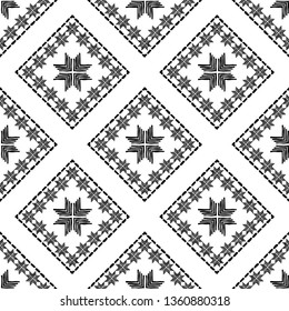 Ethnic boho seamless pattern. Embroidery on fabric. Patchwork texture. Weaving. Traditional ornament. Tribal pattern. Folk motif. Can be used for wallpaper, textile, invitation card, wrapping, web.