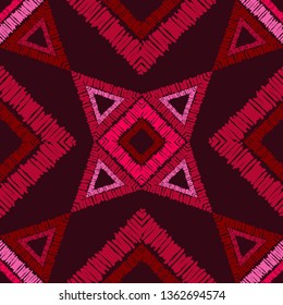 Ethnic boho seamless pattern. Embroidery on fabric. Patchwork texture. Weaving. Traditional ornament. Tribal pattern. Folk motif. Can be used for wallpaper, textile, invitation card, wrapping, web.