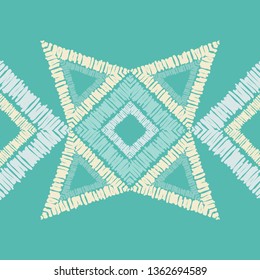 Ethnic boho seamless pattern. Embroidery on fabric. Patchwork texture. Weaving. Traditional ornament. Tribal pattern. Folk motif. Can be used for wallpaper, textile, invitation card, wrapping, web.