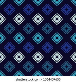 Ethnic boho seamless pattern. Embroidery on fabric. Patchwork texture. Weaving. Traditional ornament. Tribal pattern. Folk motif. Can be used for wallpaper, textile, invitation card, wrapping, web.