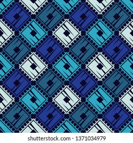Ethnic boho seamless pattern. Embroidery on fabric. Patchwork texture. Weaving. Traditional ornament. Tribal pattern. Folk motif. Can be used for wallpaper, textile, invitation card, wrapping, web.