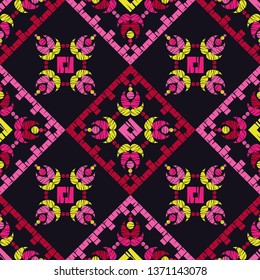 Ethnic boho seamless pattern. Embroidery on fabric. Patchwork texture. Weaving. Traditional ornament. Tribal pattern. Folk motif. Can be used for wallpaper, textile, invitation card, wrapping, web.
