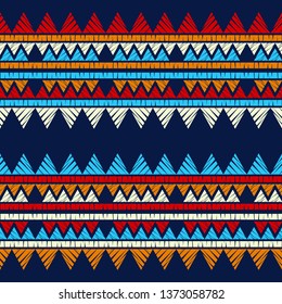 Ethnic boho seamless pattern. Embroidery on fabric. Patchwork texture. Weaving. Traditional ornament. Tribal pattern. Folk motif. Can be used for wallpaper, textile, invitation card, wrapping, web.