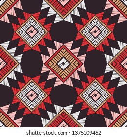 Ethnic boho seamless pattern. Embroidery on fabric. Patchwork texture. Weaving. Traditional ornament. Tribal pattern. Folk motif. Can be used for wallpaper, textile, invitation card, wrapping.
