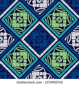 Ethnic boho seamless pattern. Embroidery on fabric. Patchwork texture. Weaving. Traditional ornament. Tribal pattern. Folk motif. Can be used for wallpaper, textile, invitation card, wrapping, web.