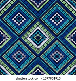 Ethnic boho seamless pattern. Embroidery on fabric. Patchwork texture. Weaving. Traditional ornament. Tribal pattern. Folk motif. Can be used for wallpaper, textile, invitation card, wrapping, web.
