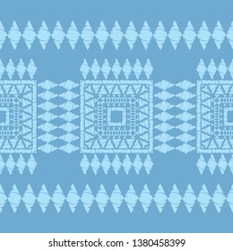 Ethnic boho seamless pattern. Embroidery on fabric. Patchwork texture. Weaving. Traditional ornament. Tribal pattern. Folk motif. Can be used for wallpaper, textile, invitation card, wrapping, web.