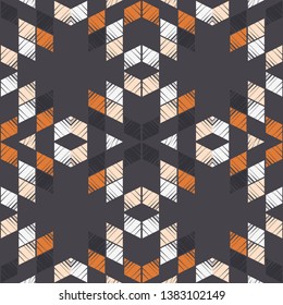 Ethnic boho seamless pattern. Embroidery on fabric. Patchwork texture. Weaving. Traditional ornament. Tribal pattern. Folk motif. Can be used for wallpaper, textile, invitation card, wrapping, web.