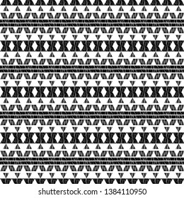 Ethnic boho seamless pattern. Embroidery on fabric. Patchwork texture. Weaving. Traditional ornament. Tribal pattern. Folk motif. Can be used for wallpaper, textile, invitation card, wrapping, web.