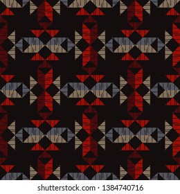 Ethnic boho seamless pattern. Embroidery on fabric. Patchwork texture. Weaving. Traditional ornament. Tribal pattern. Folk motif. Can be used for wallpaper, textile, invitation card, wrapping, web.
