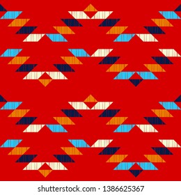 Ethnic boho seamless pattern. Embroidery on fabric. Patchwork texture. Weaving. Traditional ornament. Tribal pattern. Folk motif. Can be used for wallpaper, textile, invitation card, wrapping, web.