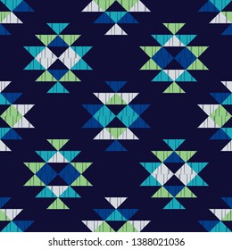 Ethnic boho seamless pattern. Embroidery on fabric. Patchwork texture. Weaving. Traditional ornament. Tribal pattern. Folk motif. Can be used for wallpaper, textile, invitation card, wrapping, web.