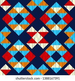 Ethnic boho seamless pattern. Embroidery on fabric. Patchwork texture. Weaving. Traditional ornament. Tribal pattern. Folk motif. Can be used for wallpaper, textile, invitation card, wrapping, web.