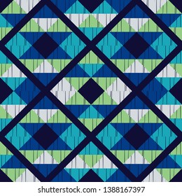 Ethnic boho seamless pattern. Embroidery on fabric. Patchwork texture. Weaving. Traditional ornament. Tribal pattern. Folk motif. Can be used for wallpaper, textile, invitation card, wrapping, web.
