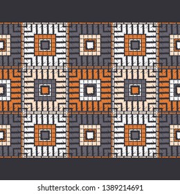 Ethnic boho seamless pattern. Embroidery on fabric. Patchwork texture. Weaving. Traditional ornament. Tribal pattern. Folk motif. Can be used for wallpaper, textile, invitation card, wrapping, web.