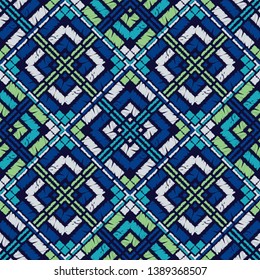 Ethnic boho seamless pattern. Embroidery on fabric. Patchwork texture. Weaving. Traditional ornament. Tribal pattern. Folk motif. Can be used for wallpaper, textile, invitation card, wrapping, web.