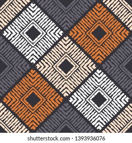 Ethnic boho seamless pattern. Embroidery on fabric. Patchwork texture. Weaving. Traditional ornament. Tribal pattern. Folk motif. Can be used for wallpaper, textile, invitation card, wrapping, web.