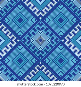 Ethnic boho seamless pattern. Embroidery on fabric. Patchwork texture. Weaving. Traditional ornament. Tribal pattern. Folk motif. Can be used for wallpaper, textile, invitation card, wrapping, web.