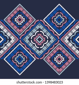 Ethnic boho seamless pattern. Embroidery on fabric. Patchwork texture. Weaving. Traditional ornament. Tribal pattern. Folk motif. Can be used for wallpaper, textile, invitation card, wrapping, web.