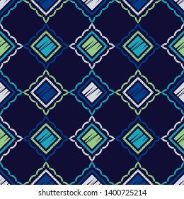 Ethnic boho seamless pattern. Embroidery on fabric. Patchwork texture. Weaving. Traditional ornament. Tribal pattern. Folk motif. Can be used for wallpaper, textile, invitation card, wrapping, web.