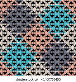 Ethnic boho seamless pattern. Embroidery on fabric. Patchwork texture. Weaving. Traditional ornament. Tribal pattern. Folk motif. Can be used for wallpaper, textile, invitation card, wrapping, web.