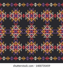 Ethnic boho seamless pattern. Embroidery on fabric. Patchwork texture. Weaving. Traditional ornament. Tribal pattern. Folk motif. Can be used for wallpaper, textile, invitation card, wrapping, web.
