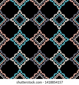 Ethnic boho seamless pattern. Embroidery on fabric. Patchwork texture. Weaving. Traditional ornament. Tribal pattern. Folk motif. Can be used for wallpaper, textile, wrapping, web.