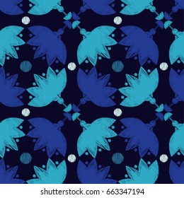 Ethnic boho seamless pattern. Embroidery on fabric. Retro motif. Vector illustration. Textile rapport.