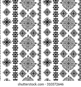 Ethnic boho seamless pattern. Ethno ornament. Tribal art repeatable background in black and white. Fabric design, wallpaper, wrapping