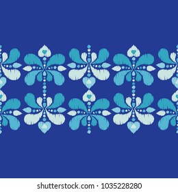 Ethnic boho seamless pattern. Flowers background. Scribble texture. Embroidery on fabric. Folk motif. Textile rapport.