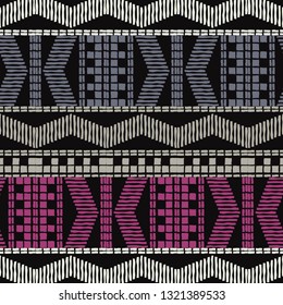 Ethnic boho seamless pattern. Hand hatching. Patchwork texture. Weaving. Traditional ornament. Tribal pattern. Folk motif. Can be used for wallpaper, textile, invitation card, wrapping, web page.