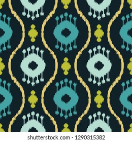 Ethnic boho seamless pattern. Ikat. Traditional ornament. Geometric background. Folk motif. Can be used for wallpaper, textile, invitation card, wrapping, web page background.
