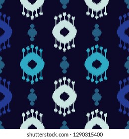 Ethnic boho seamless pattern. Ikat. Traditional ornament. Geometric background. Folk motif. Can be used for wallpaper, textile, invitation card, wrapping, web page background.
