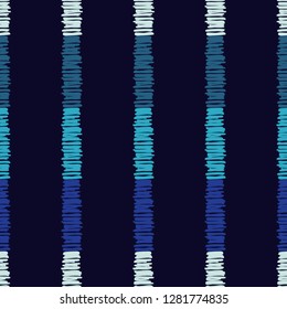 Ethnic boho seamless pattern. Mosaic of painted strips. Embroidery on fabric. Traditional ornament. Tribal pattern. Folk motif. Can be used for wallpaper, textile, invitation card, wrapping, web.