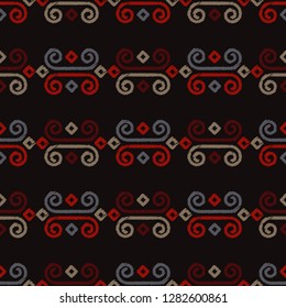 Ethnic boho seamless pattern. A mosaic of stripes and squiggles. Embroidery on fabric. Traditional ornament. Tribal pattern. Folk motif. Can be used for wallpaper, textile, invitation card, wrapping.