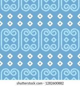 Ethnic boho seamless pattern. A mosaic of stripes and squiggles. Embroidery on fabric. Traditional ornament. Tribal pattern. Folk motif. Can be used for wallpaper, textile, invitation card, wrapping.