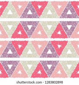 Ethnic boho seamless pattern. Mosaic of painted triangles. Embroidery on fabric. Traditional ornament. Tribal pattern. Folk motif. Can be used for wallpaper, textile, invitation card, wrapping, web.