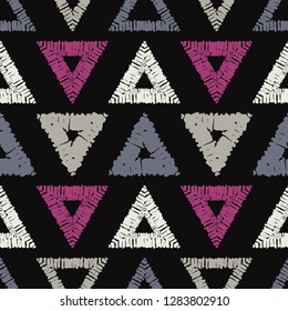 Ethnic boho seamless pattern. Mosaic of painted triangles. Embroidery on fabric. Traditional ornament. Tribal pattern. Folk motif. Can be used for wallpaper, textile, invitation card, wrapping, web.
