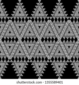 Ethnic boho seamless pattern. Mosaic of triangles. Patchwork texture. Weaving. Traditional ornament. Tribal pattern. Folk motif. Can be used for wallpaper, textile, invitation card, wrapping, web.