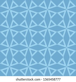 Ethnic boho seamless pattern. Patterned triangles. Embroidery on fabric. Patchwork texture. Weaving. Traditional ornament. Tribal pattern. Folk motif. Can be used for wallpaper, textile.