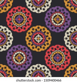 Ethnic boho seamless pattern. Polka dots. Embroidery on fabric. Patchwork texture. Weaving. Traditional ornament. Tribal pattern. Folk motif. Can be used for wallpaper, textile, wrapping, web.