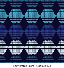 Ethnic boho seamless pattern. The shapes of blue hexagons. Traditional ornament. Tribal pattern. Folk motif. Can be used for wallpaper, textile, invitation card, wrapping, web page background.